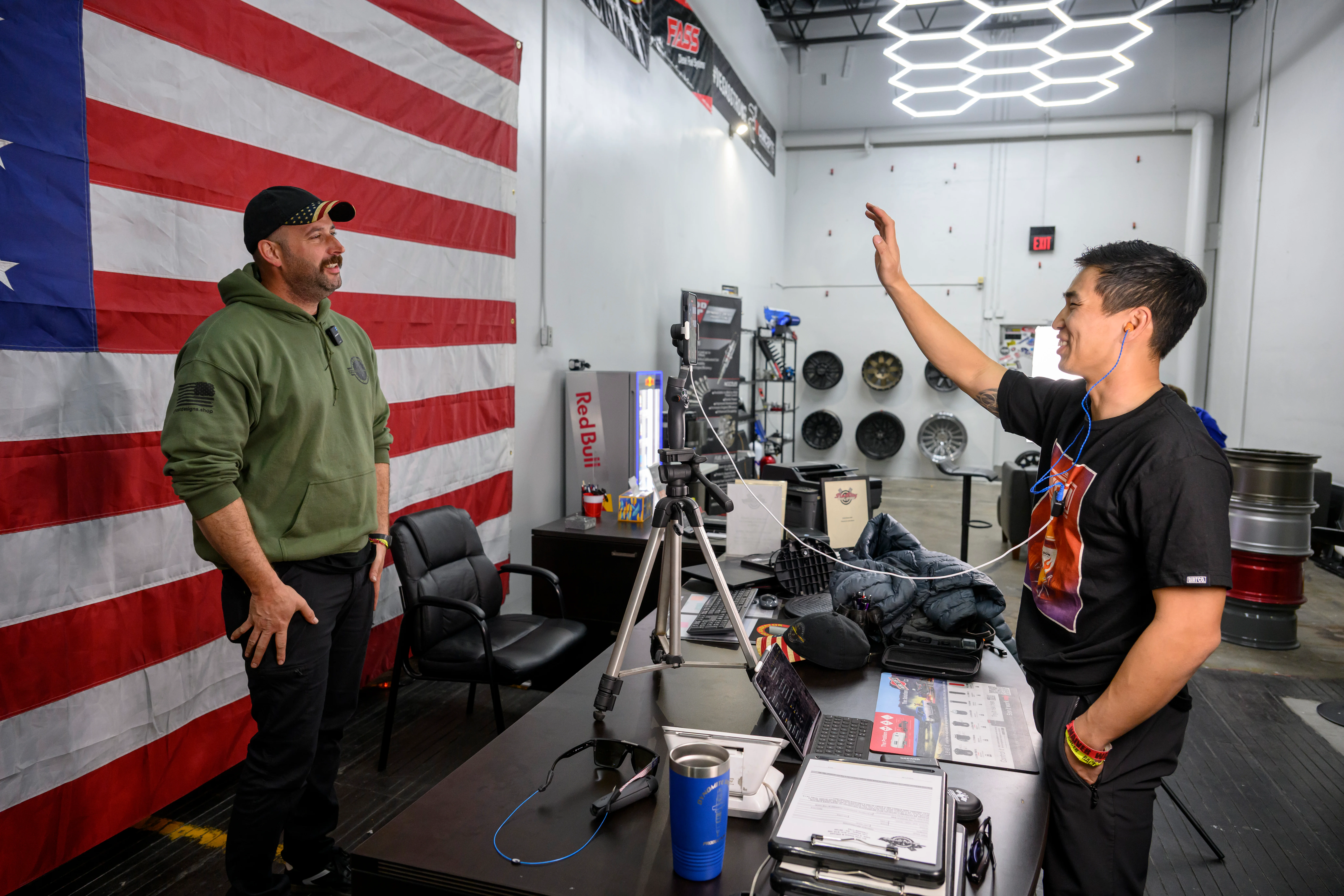 Andy Lee interviewing a motorsports participant at the Mint 400