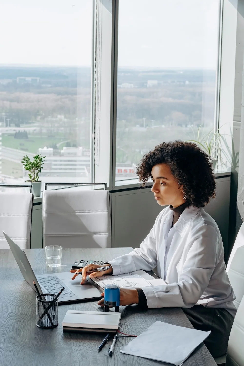 A business owner reviewing and assessing their social media marketing needs